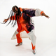 Adekunle Gold posing in dance mode with his braids overlowing